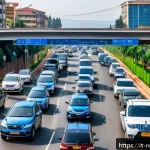 Home 20 르완다의 도로 교통 - A bustling urban street scene in Kigali, Rwanda, featuring advanced traffic monitoring technology: m...